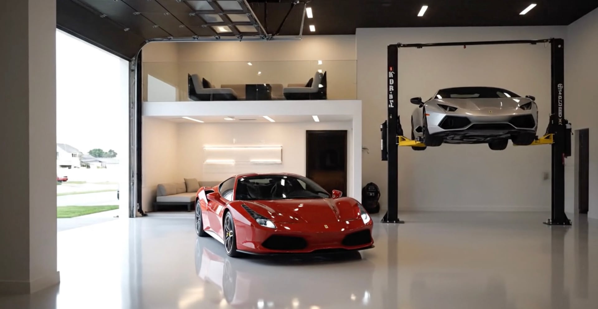 Luxury garage interior showcasing premium finishes, epoxy flooring, and elegant lighting at Garage 30A