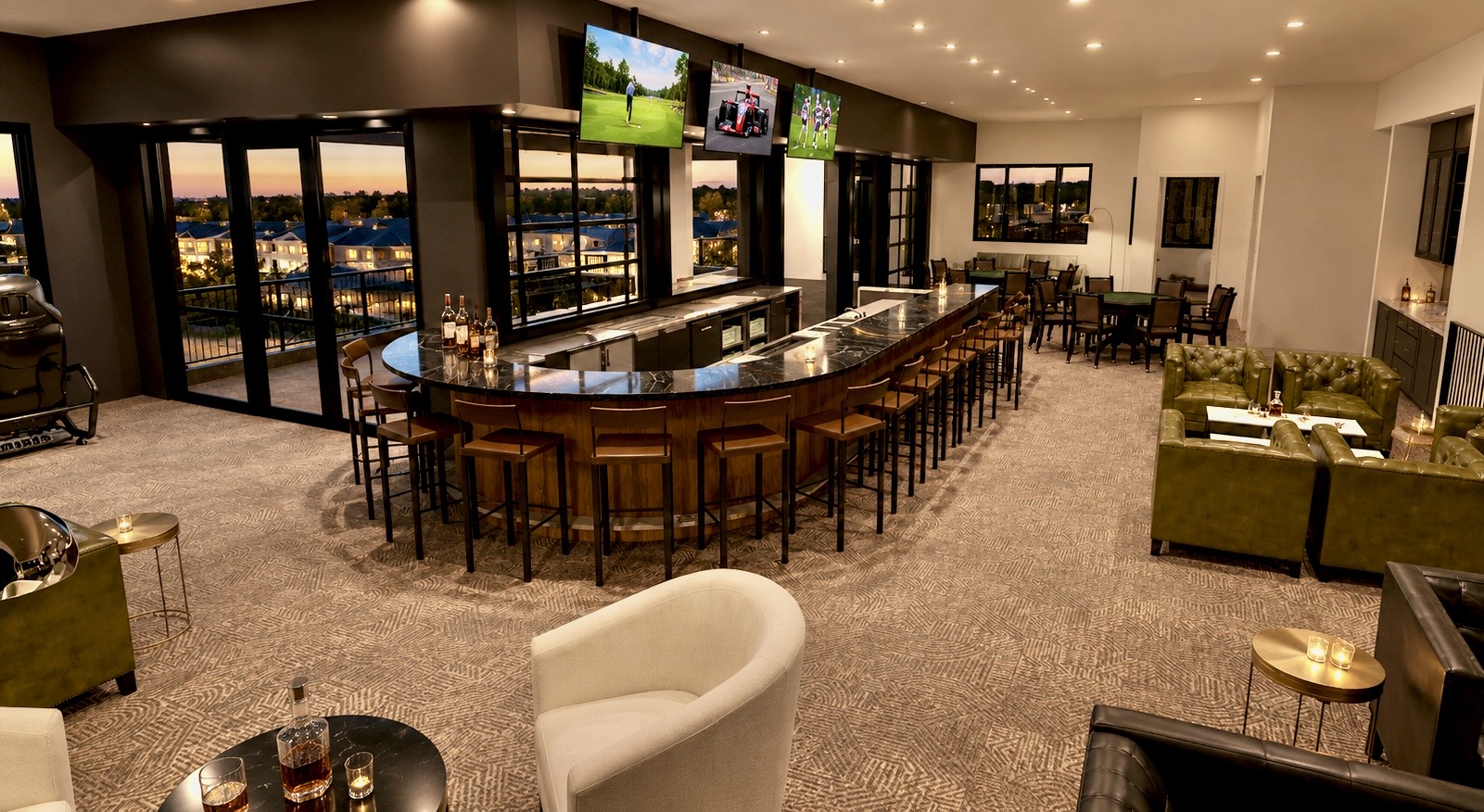 Clubhouse bar and lounge with leather seating, sports viewing, and full-service bar